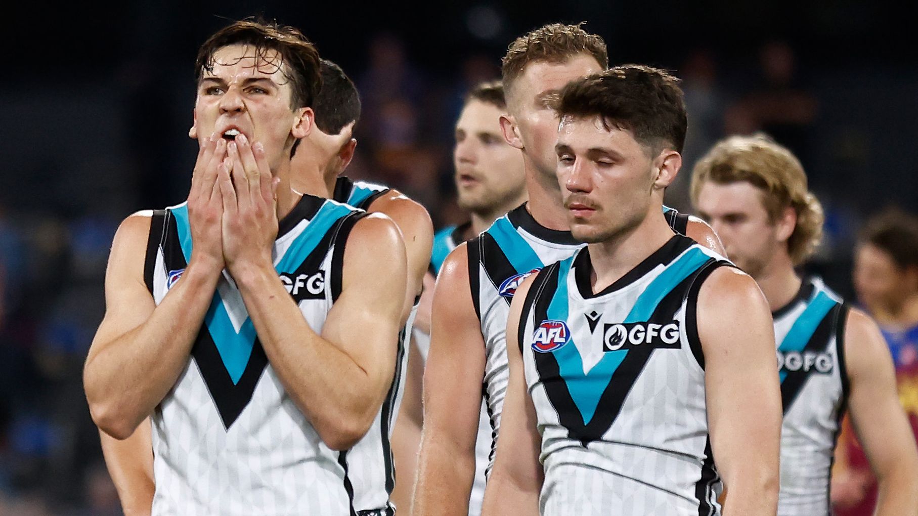 BRISBANE, AUSTRALIA - SEPTEMBER 09: Connor Rozee (left) and Jed McEntee of the Power look dejected after a loss during the 2023 AFL Second Qualifying Final match between the Brisbane Lions and the Port Adelaide Power at The Gabba on September 09, 2023 in Brisbane, Australia. (Photo by Michael Willson/AFL Photos via Getty Images)