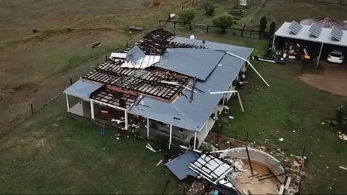 This home and swimming pool sustained severe damage. 