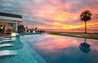 Pool at Pullman Resort & Spa Fiji, sunset