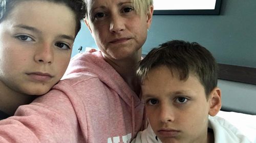 Sarah Greig and her sons have been forced into isolation at the Novotel in Brisbane.