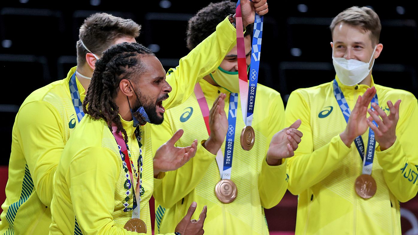 Patty Mills of Team Australia celebrates with his bronze medal during the Men&#x27;s Basketball medal ceremony 
