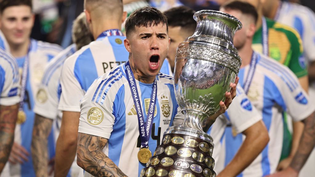Enzo Fernandez celebrates with the trophy after the team&#x27;s victory during the CONMEBOL Copa America 2024 Final match between Argentina and Colombia.
