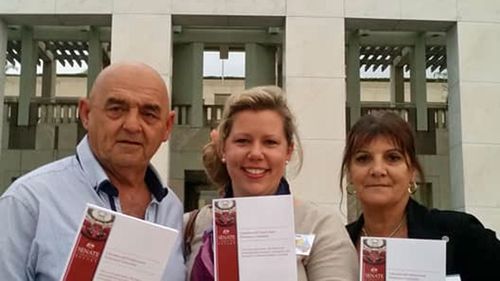 Lana Cormie pictured with Jack Brownlee's parents David and Janine outside Parliament House after the senate inquiry released its final report into workplace deaths last month. 