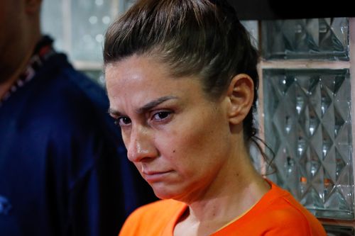 US national, Jennifer Erin Talbot looks on during a press conference at the National Bureau of Investigation (NBI) in Manila, Philippines.