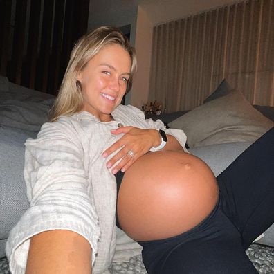 Steph Claire Smith shows off her belly in her third trimester of pregnancy.