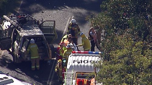 Police are investigating the crash between the four-wheel-drive and station wagon. (9NEWS)