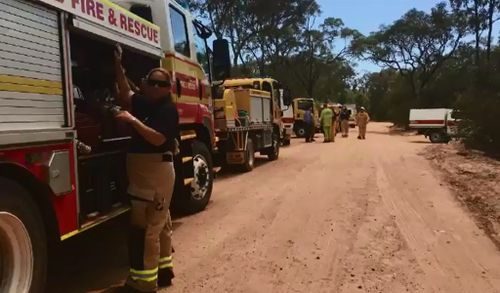 Firefighters arrive at the Burrum Coast National Park. (9NEWS)