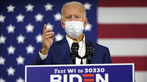 Joe Biden says Donald Trump "panicked" in the face of the coronavirus pandemic.