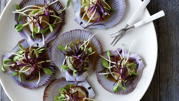 Scallops with citrus dressing and sprouts