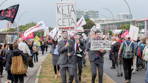 Protesters rally across Germany against mega transatlantic trade deal