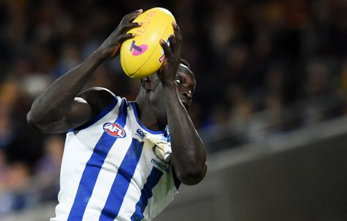 But as tensions simmered between police, the public and many African youth, the AFL’s first Sudanese-born player knew he had to step in. (AAP)