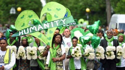 Mourners walked to Grenfell Tower in a silent procession. Picture: Getty