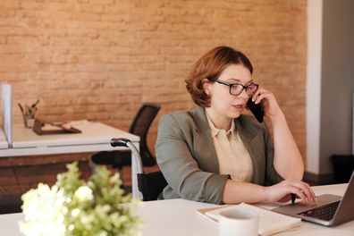 Woman working on phone