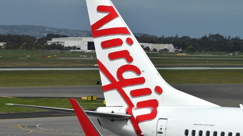 Virgin Australia cut has more flights as well as reduced executive fees over the impact of coronavirus.