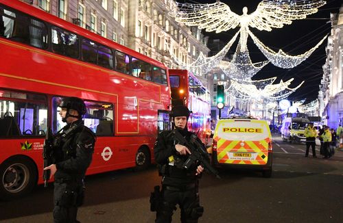 Armed officers were called to the street. (AAP)