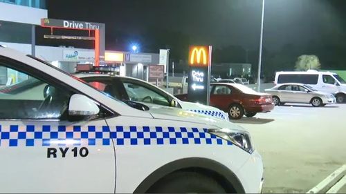 A 20-year-old man was taken to hospital with facial injuries after allegedly being attacked with a baseball bat in a brawl outside a Sydney McDonald's this morning. Picture: 9NEWS.