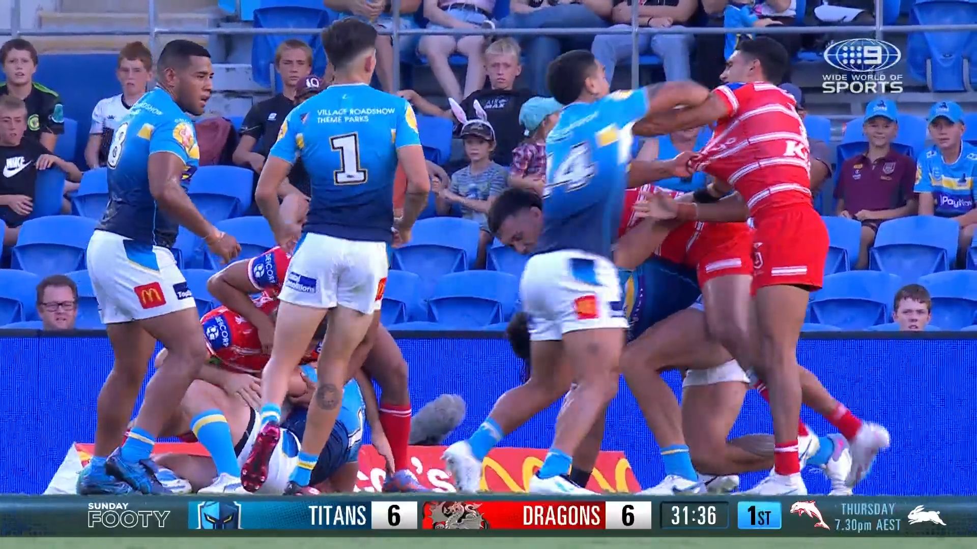 Punch missed as Titans, Dragons players brawl in fiery Gold Coast victory