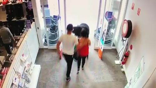 The pair walk calmly out of the store pushing the pram. Picture: Facebook