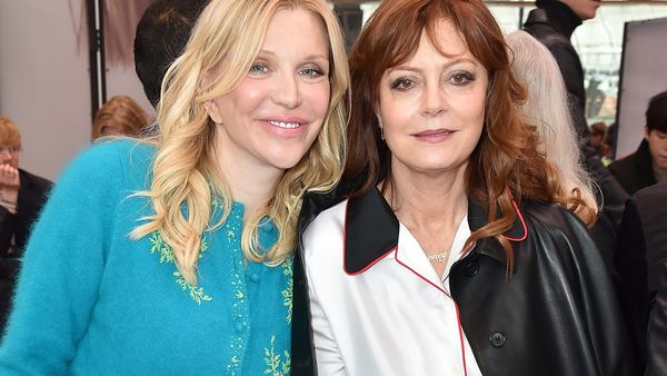Courtney Love and Susan Sarandon in the Prada front row. Image: Getty
