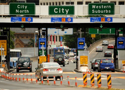 Signs on the Harbour Bridge alerts drivers of changes to tolls in Sydney in 2009. (AAP)