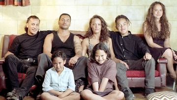 The cast who play the Heke family in the film Once Were Warriors pose together on set in 1994 and (below) at the 20-year reunion in 2014. (Supplied)