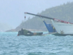 The wreckage of what is believed to an MRH-90 Taipan in Whitsunday waters. Search and rescue crews have found debris in the search for four Australian defence helicopter crew who are feared dead after their aircraft went down off Hamilton Island in Queensland late last night.