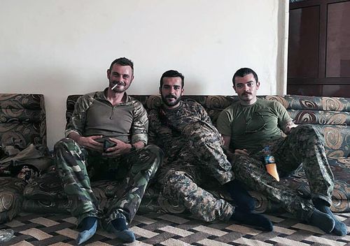 Queensland man Ashley Dyball (right), also known as Mitchell Scott, pictured with the YPG who are battling Islamic State in Syria. (AAP)