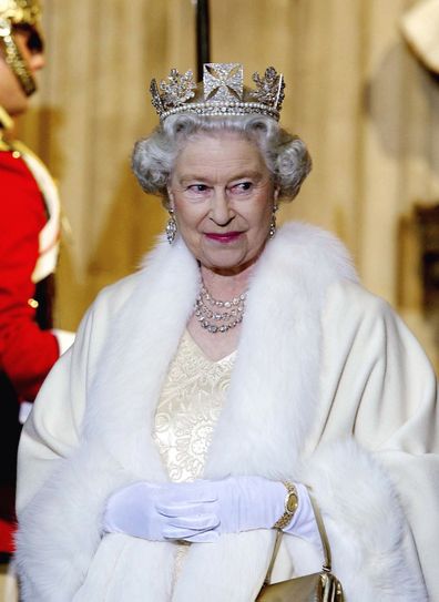 Queen Elizabeth II Smiling As She Arrives At The Palace Of Westminster For The State Opening Of Parliament. 