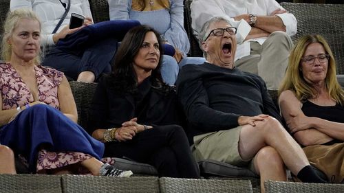 Bill Gates yawning while watching the tennis in California.