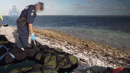 About one tonne of illicit drugs has been found on a West Australian island after a yacht ran aground on a reef.