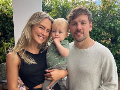 Steph Claire Smith poses with husband Josh Miller and their son Harvey.