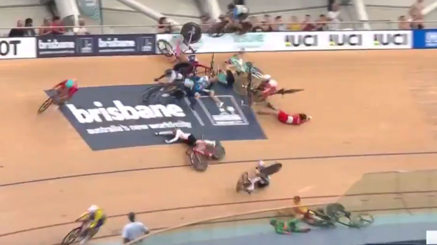 Riders fly through the air after crashing at the World Cup