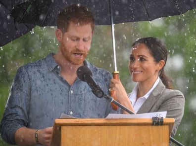 Prince Harry Meghan Markle umbrella rain Dubbo