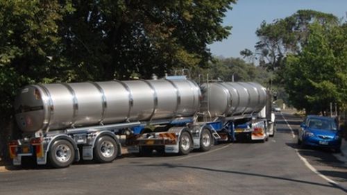 Tanker trucks take water bored from a bore near Stanley to the Asahi plant in Albury, NSW.