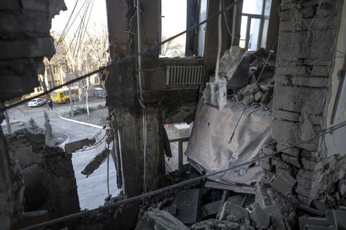 A damaged part of the hospital of Donetsk Clinical Territorial Medical Association is seen after what Russian officials in Donetsk said it was a shelling by Ukrainian forces, in Donetsk, in Russian-controlled Donetsk region, Ukraine, Tuesday, Dec. 20, 2022.