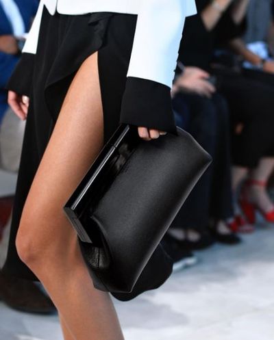 Not so basic black. Michael Kors ditches the bling to make a bag with a covet factor through the roof.