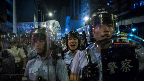 Police used pepper spray to control the crowds. (AFP)