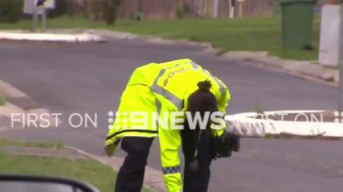 Police scoured the scene following the attack. (9NEWS)