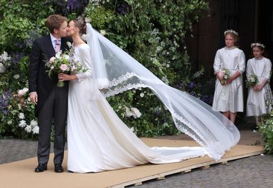 Hugh Grosvenor, Duke of Westminster and Olivia Grosvenor, Duchess of Westminster kiss after their wedding ceremony at Chester Cathedral on June 07, 2024 in Chester, England 