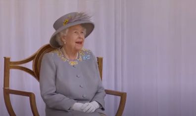 The Queen broke into a wide smile as she watched the incredible display.