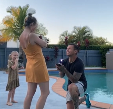 Todd Carney proposes to his girlfriend Susie Bradley.