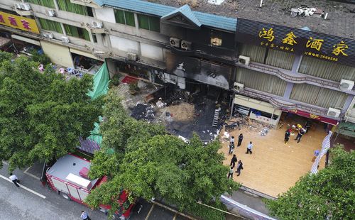 An aerial view of the site of a karaoke bar in Yingde where a fire broke out. (AAP)