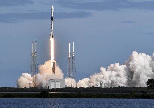 A SpaceX Falcon 9 rocket lifts off from Cape Canaveral Air Force Station carrying 60 Starlink satellites. The Starlink constellation will eventually consist of thousands of satellites designed to provide world wide high-speed internet service.