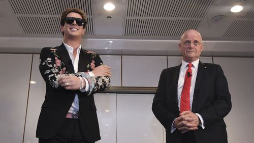 Milo Yiannopoulos, seen here with former senator David Leyonhjelm, is a notorious right-wing troll.