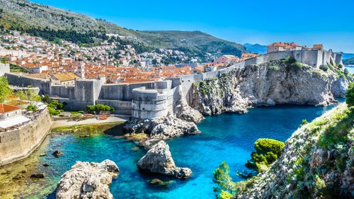 Two Australian tourists have been seriously injured after falling 10m from a medieval wall in the holiday destination of Croatia.