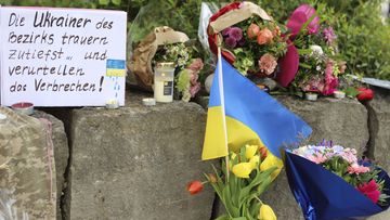 Two Ukrainian men were stabbed to death at a shopping centre in southern Germany.