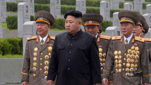 North Korean leader Kim Jong-Un (C) visiting the Fatherland Liberation War Martyrs Cemetery in Pyongyang. (AFP)