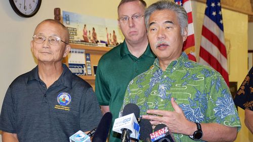 Hawaii Gov. David Ige (R) speaks to reporters in Honolulu after the alert. (AP)