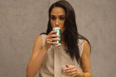 Meghan Markle tastes beer during an appearance on the YouTube program Get Down with Sean and Marley.