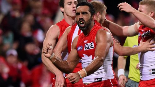 Goodes performing the spear dance on the field. (AAP)